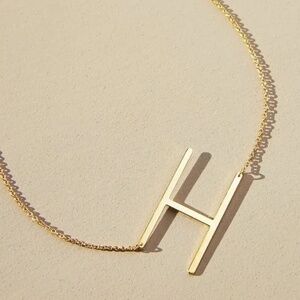 New with tag.  Anthropologie Gold Initial Necklace. 16”